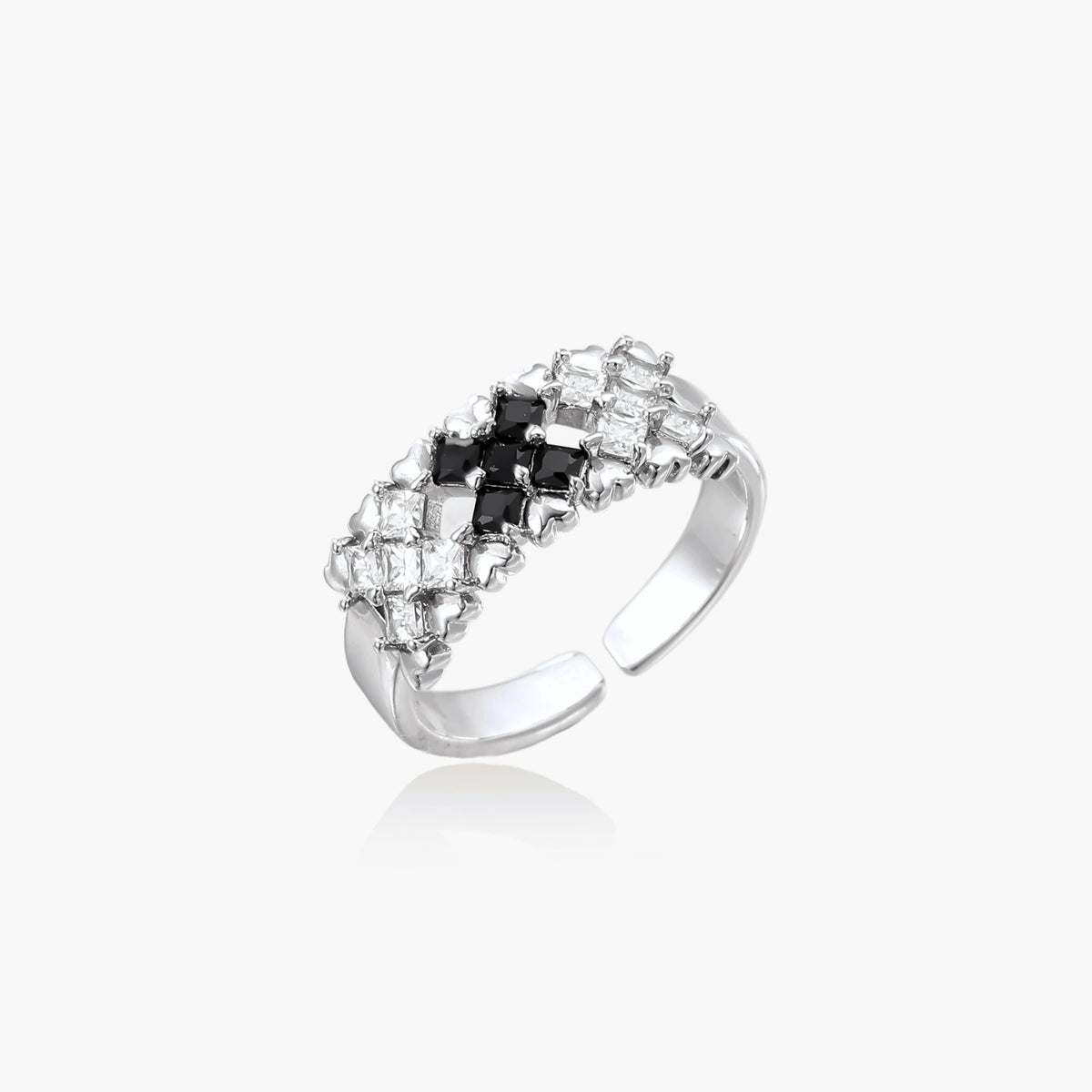Adjustable white gold plated ring with geometric grid of black and clear zirconia stones in checkerboard pattern