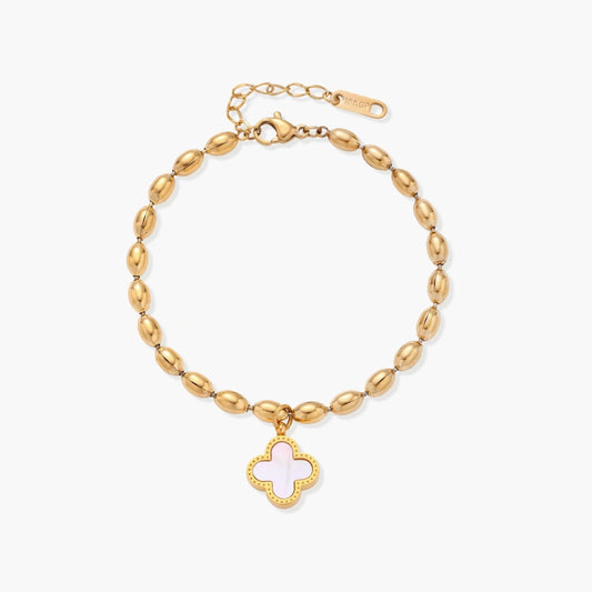 18K gold-plated oval bead bracelet with a four-leaf clover charm in mother-of-pearl or black enamel, adjustable lobster clasp, on white background.