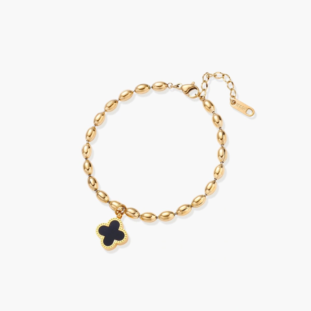 18K gold-plated oval bead bracelet with a four-leaf clover charm in mother-of-pearl or black enamel, adjustable lobster clasp, on white background.