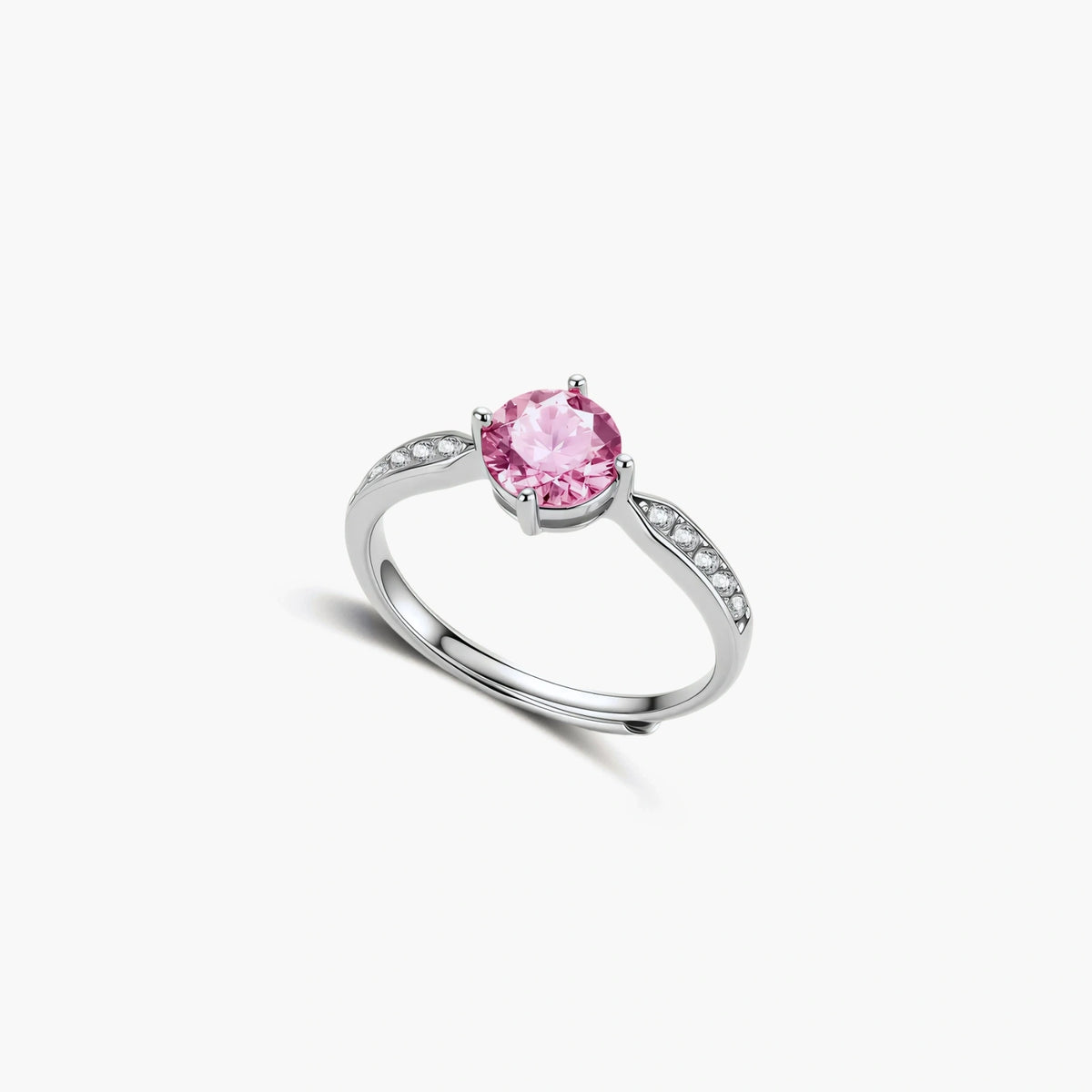 Brilliant pink moissanite ring in sterling silver 4-prong setting with accent stones on adjustable band