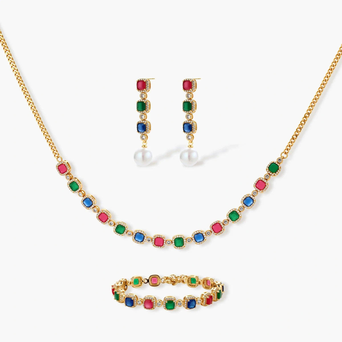Gold-plated jewelry set with red, green, and blue cubic zirconia stones including necklace, bracelet, and drop earrings.