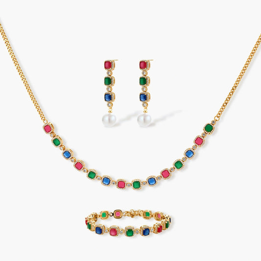 Gold-plated jewelry set with red, green, and blue cubic zirconia stones including necklace, bracelet, and drop earrings.