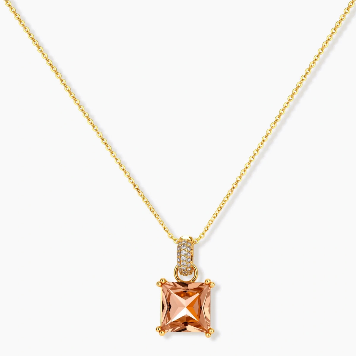 14K gold plated jewelry set featuring square champagne CZ stones with sparkling huggie earrings on cream background.
