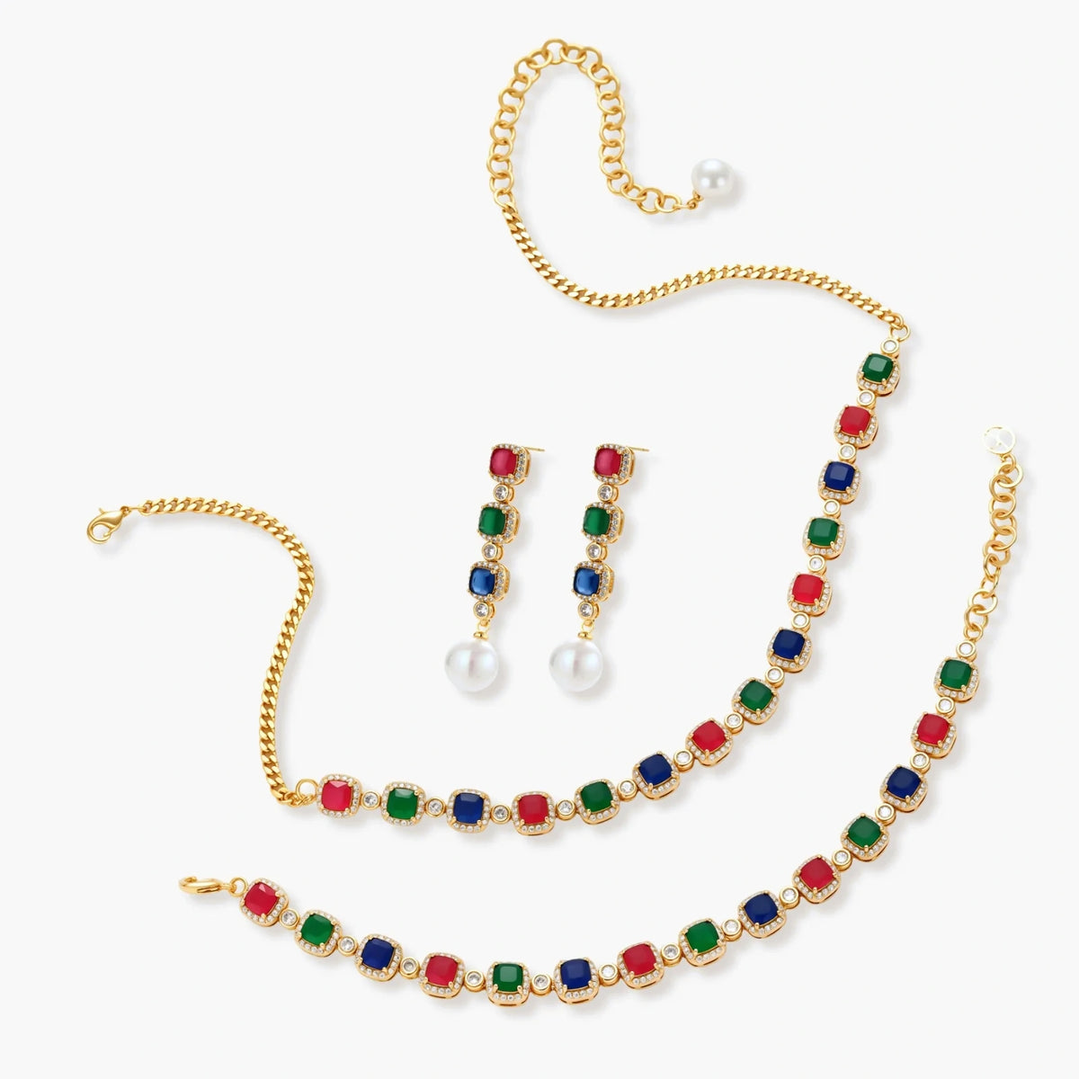 Gold-plated jewelry set with red, green, and blue cubic zirconia stones including necklace, bracelet, and drop earrings.
