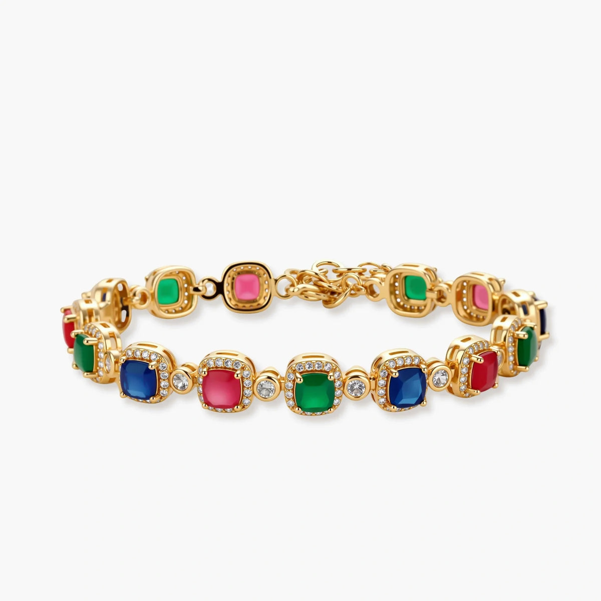 Gold-plated jewelry set with red, green, and blue cubic zirconia stones including necklace, bracelet, and drop earrings.